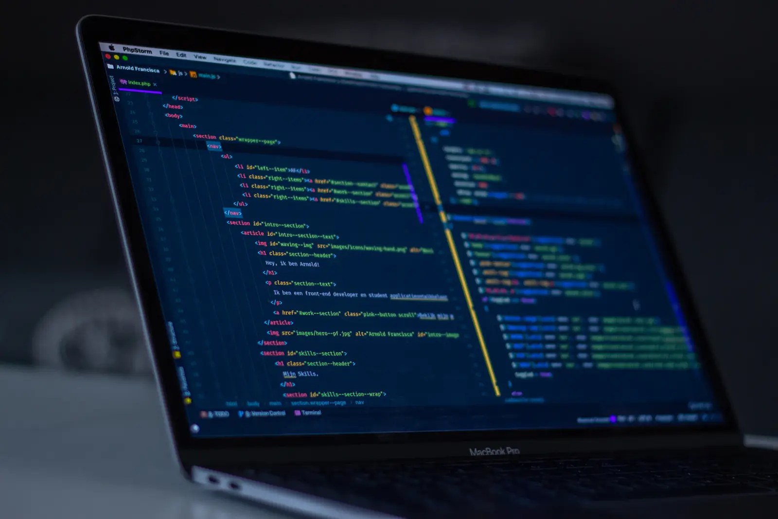 Application code open in an editor on a laptop